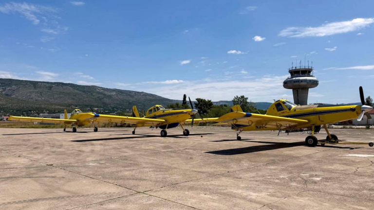 Three firefighting AT-802F aircraft sitting on a tarmac